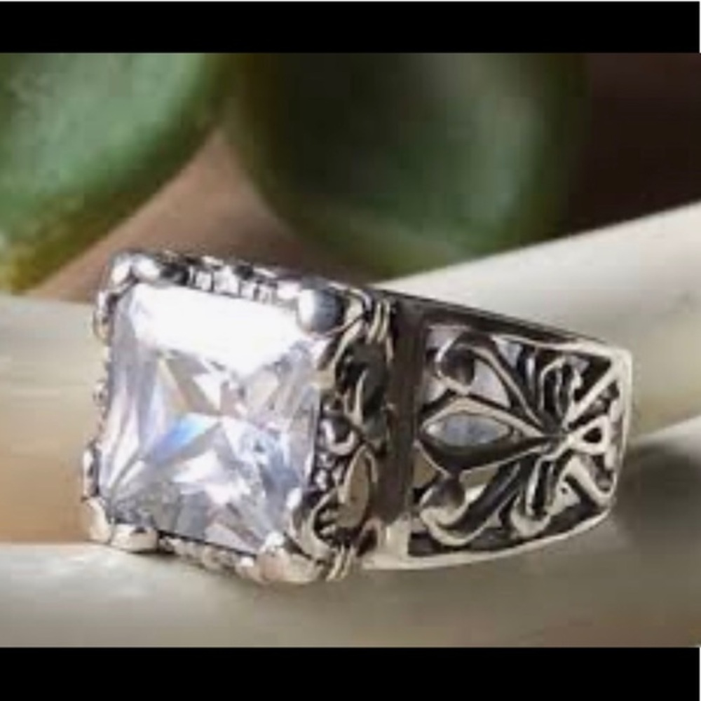 Silpada Uptown Ring. Sterling silver, cut out design on sides cz in the center 7